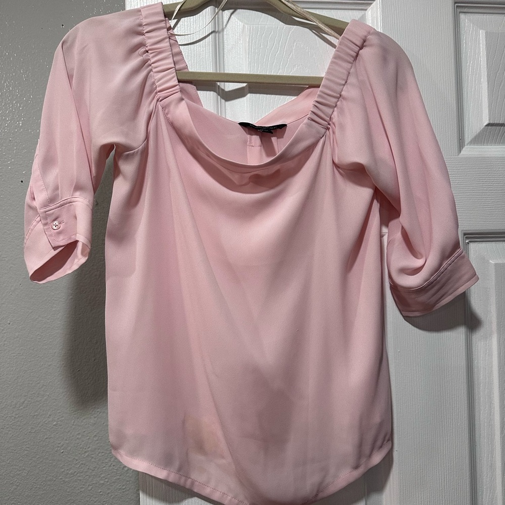 banana republic 3/4 sleeve petite xs has a stain on the front bottom right side